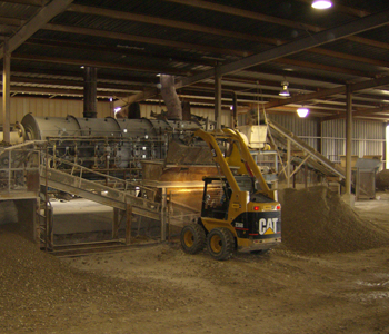 Bentonite being loaded into a dryer Bentonite being loaded into a dryer
